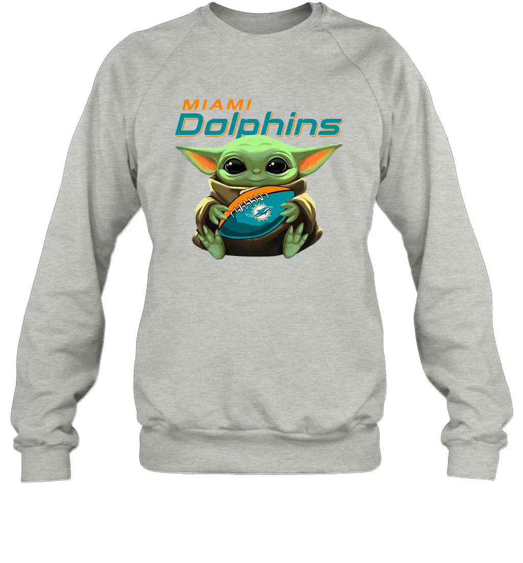 Baby Yoda Loves The Miami Dolphins Star Wars Baby Yoda Hugs Dolphins NFL Adult Sweatshirt